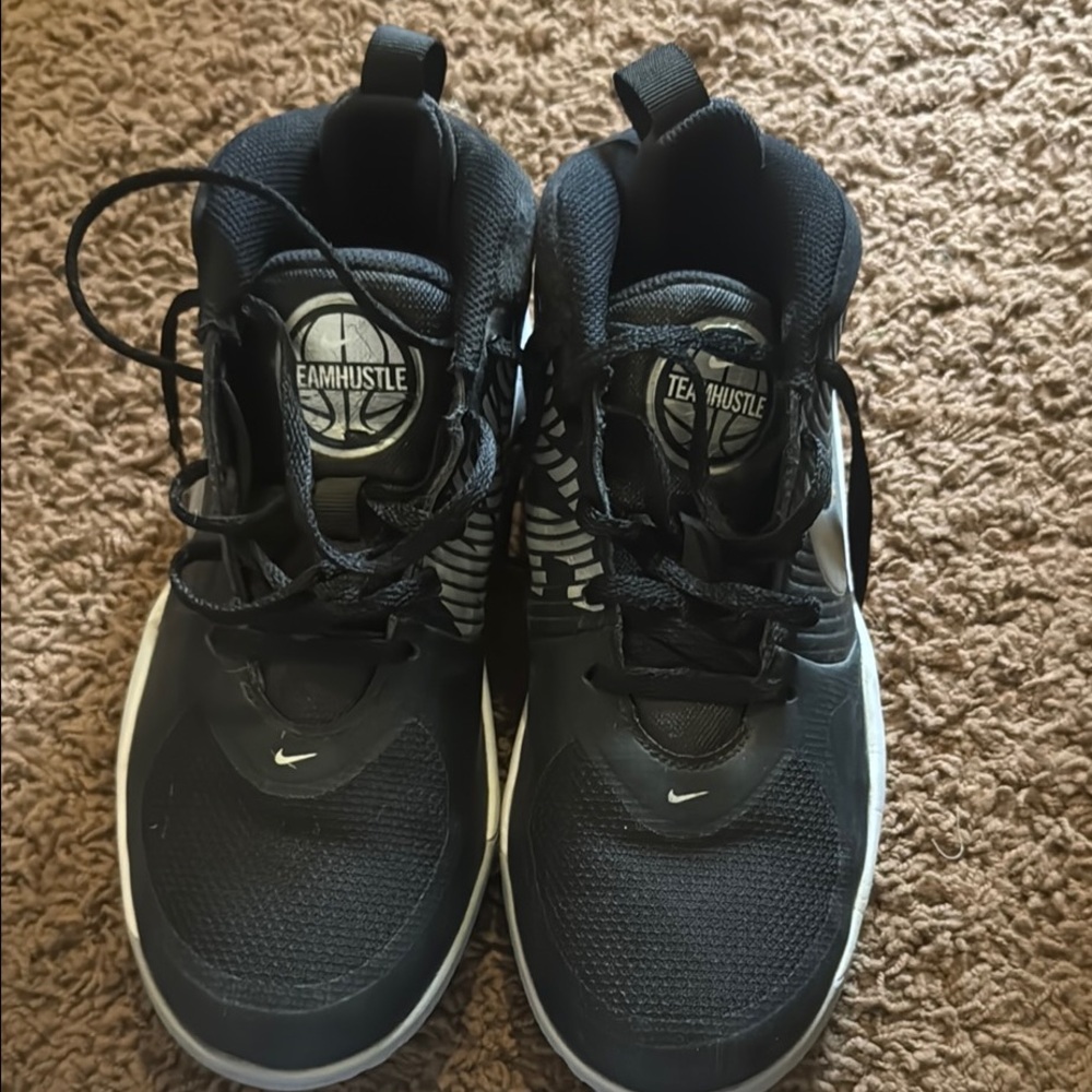 Nike Team Hustle Black and White Basketball Shoes